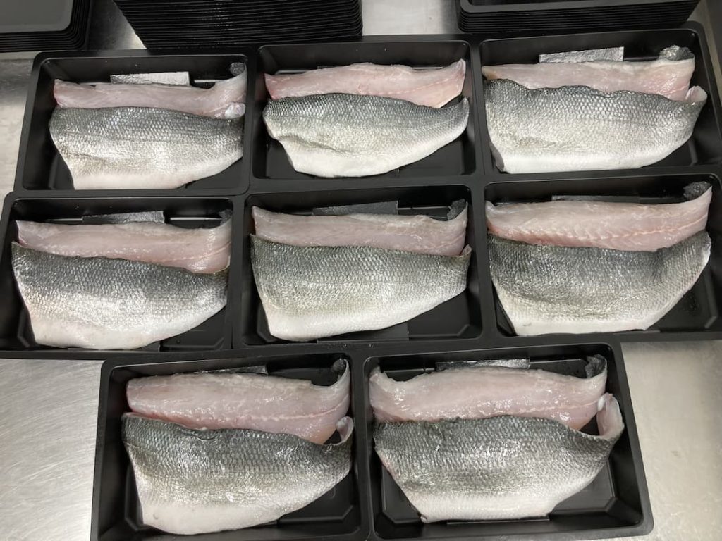 Portioned and prepared fish